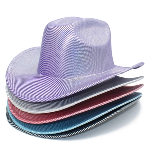 Detail view of various metallic holographic cowboy hats in vibrant neon party colors