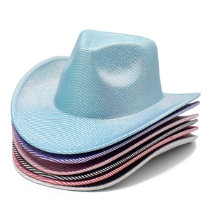 Stack of shiny metallic cowboy hats in various colors with textured finish for party use