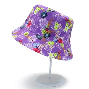 Floral reversible bucket hat for women with purple rose print and white lace details