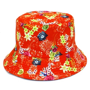 Reversible red floral bucket hat with vibrant flower prints and sun protection brim