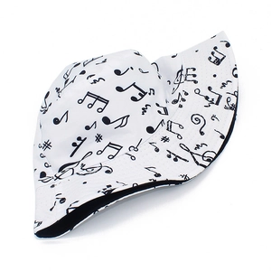 Reversible music note print bucket hat in black and white for outdoor sun protection