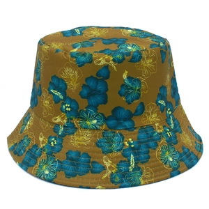 Double-sided sun hat with tropical floral print and reinforced brim stitching for outdoors