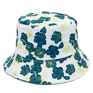 Floral reversible bucket hat with tropical hibiscus print for sun protection and outdoor use