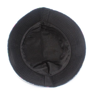 Detail showing inner black cotton fabric and parallel reinforced stitching on bucket hat brim