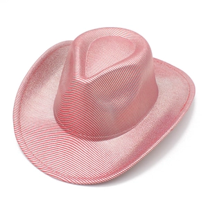 Detail of pink and silver sequin woven texture on a classic western cowboy party hat