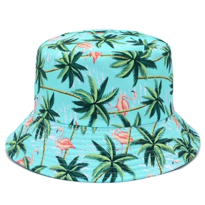 Detail of blue sun hat with tropical coconut trees and pink flamingos print