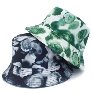 Fashionable floral print bucket hats in green and black for summer sun protection