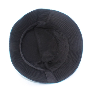 Detail view of the black inner fabric lining and floral print brim of the sun bucket hat