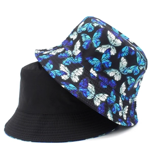 Detail showing high-quality black canvas bucket hat and blue butterfly print pattern