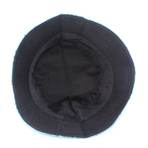 Detail of black lining and floral pattern on foldable fisherman sun hat for women