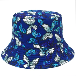 Close-up of vibrant butterfly print on dark blue bucket hat with quality stitching