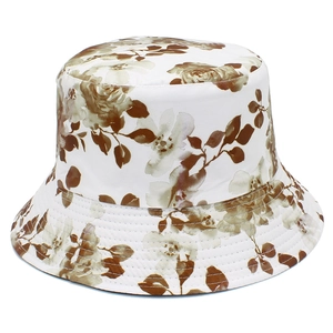 Women's foldable sun bucket hat with vintage brown ink floral print on white fabric