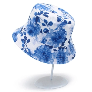 Women's summer sun hat with artistic blue ink floral print and foldable brim