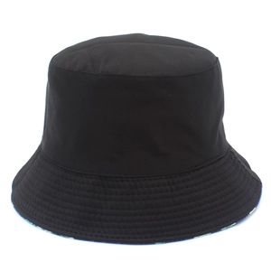 Detail of a black cotton bucket hat with blue butterfly pattern and reinforced brim stitching