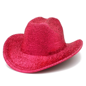 Detail of hot pink cowboy hat with a shimmering metallic finish and wide brim