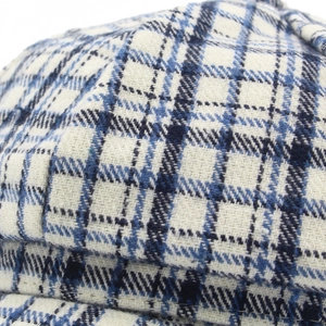 Gorra de estilo británico con diseño de cuadros azul y blanco en tela de tweed