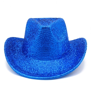 Macro shot of sparkling blue sequins and glitter texture on a Western cowboy party hat