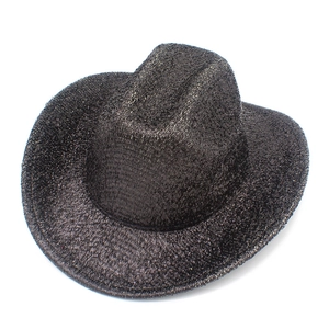 Close-up of sparkling black sequins and classic curved brim on the western cowboy hat