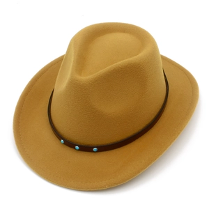 Detailed top view of a camel western cowboy hat with turquoise beads and brown leather strap