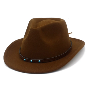 Detail of dark brown wool cowboy hat with leather band and turquoise stone embellishments