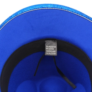 Internal view of navy felt jazz hat showing black sweatband and 65% cotton blend label