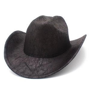 Distressed dark brown faux suede cowboy hat with wide brim and vintage cracked texture