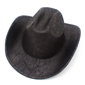 Detail shot of black faux leather cowboy hat featuring textured vintage cracked surface