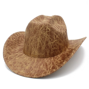 Vintage dark brown faux suede western cowboy hat with wide brim and crackle texture