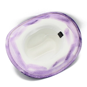 Detail view of cotton blend fedora hat interior with washing label and sweatband