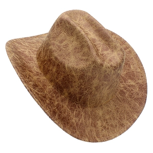 Vintage brown faux suede cowboy hat with distressed texture and wide curved brim