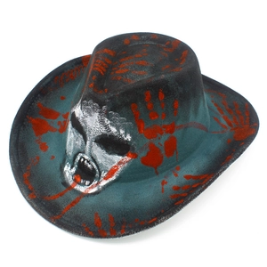 Detailed view of Halloween cowboy hat with skull pattern and red blood handprints