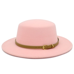 Pink wool felt boater hat featuring a brown leather belt with a golden metallic buckle