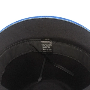 Detail view of cotton polyester blend interior lining and wash label on fedora hat