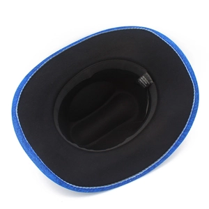 Detail view of western cowboy hat interior showing fabric label and high-quality stitching