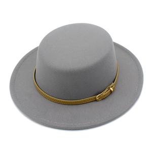 Close-up of grey wool fedora hat featuring a yellow leather belt and golden metal buckle