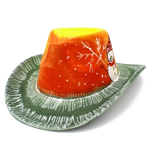 Detail of hand-painted snowman and winter scenes on a colorful western-style party hat