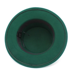 Detail view of fedora interior with adjustable sweatband and 65% cotton fabric label