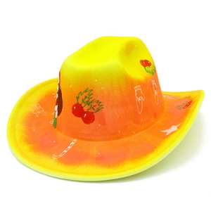 Detail of yellow-orange gradient cowboy hat with Santa Claus and festive holiday patterns