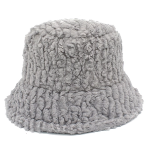 Close-up of gray lamb wool bucket hat showing thick plush texture and soft material