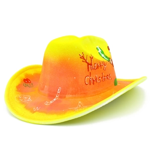 Detailed macro view of yellow-orange gradient cowboy hat with Merry Christmas print
