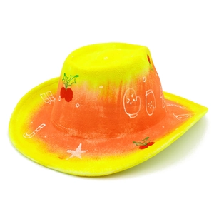 Detail view of yellow-orange gradient cowboy hat with hand-painted Christmas theme patterns