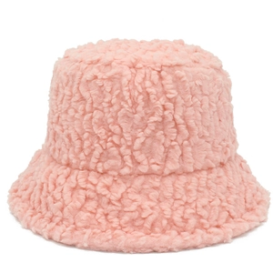 Detailed view of pink lamb wool bucket hat with thick plush texture and clean stitching