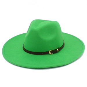 Detail view of green wool fedora hat with brown leather band and gold buckle fastener