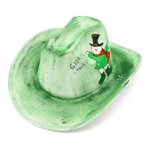 Detail of green Christmas cowboy hat featuring a hand-painted snowman and snowy stars