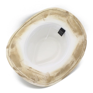 Detail of western cowboy hat interior showing sweatband and 65% cotton fabric label