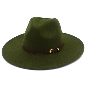 Detail of olive green fedora hat featuring a brown leather band and gold buckle