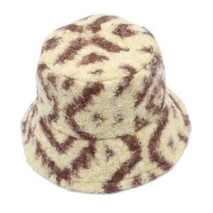 Detailed view of plush leopard print faux fur bucket hat with soft curly texture