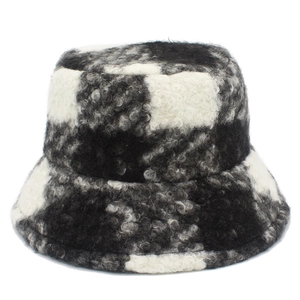 Detailed close-up showing the soft lamb wool texture and checkerboard pattern of the hat