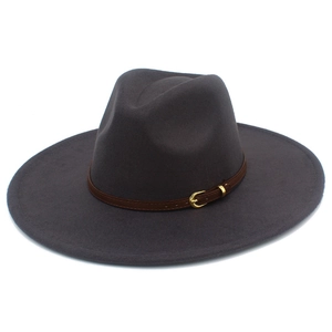 Detail view of wide-brim dark grey wool fedora with brown leather buckle strap