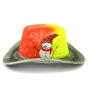 Detail of western cowboy hat with snowman print and orange to yellow gradient color